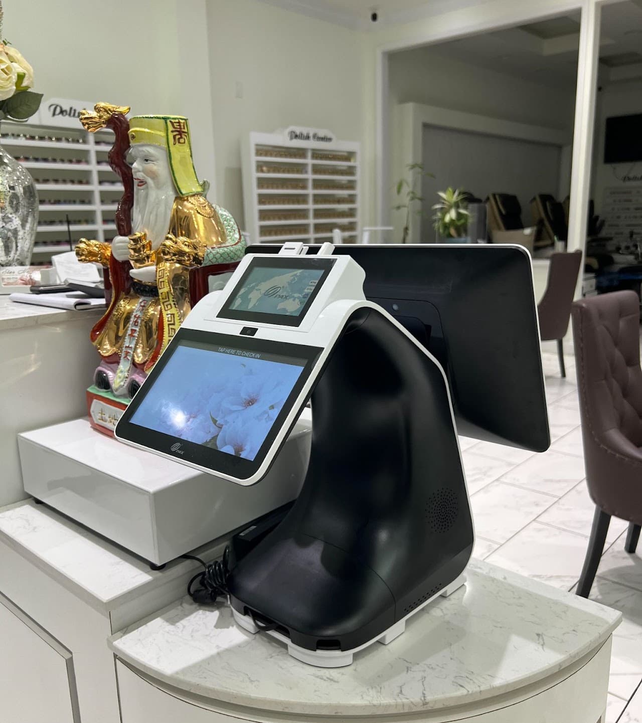 Dual-screen point-of-sale system installed inside a salon